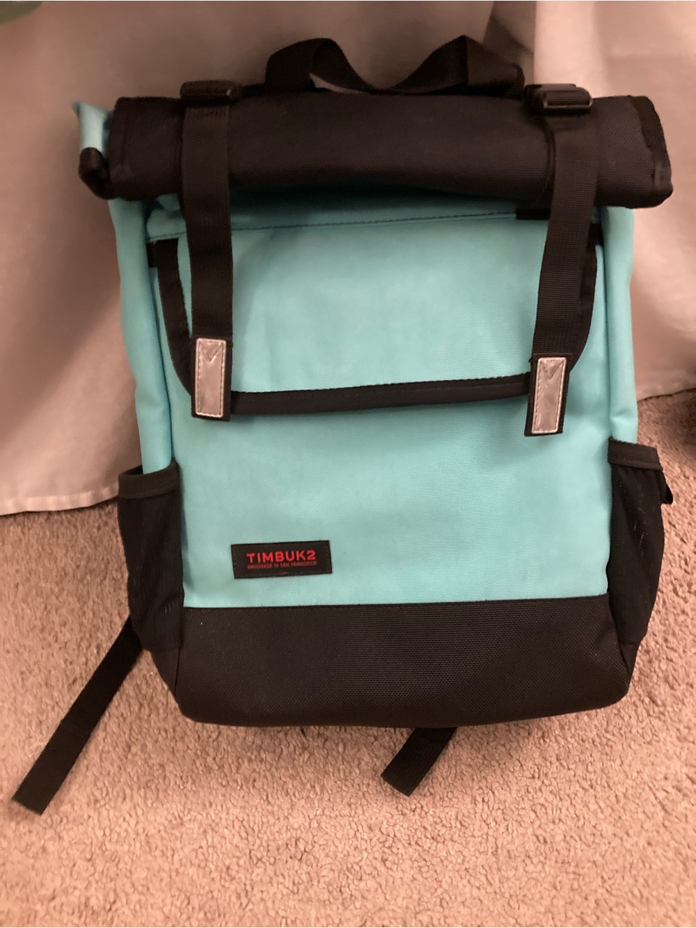Timbuk2 Men’s Roll-Top Mini Backpack in Aqua and Black